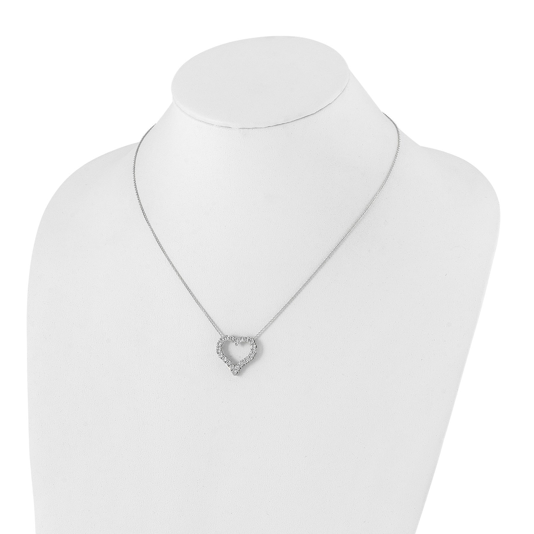 Necklace with a heart-shaped pendant on a mannequin against a white background