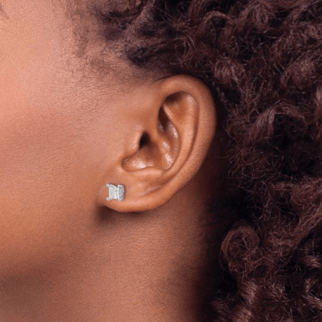 model wearing studs, diamond studs for her