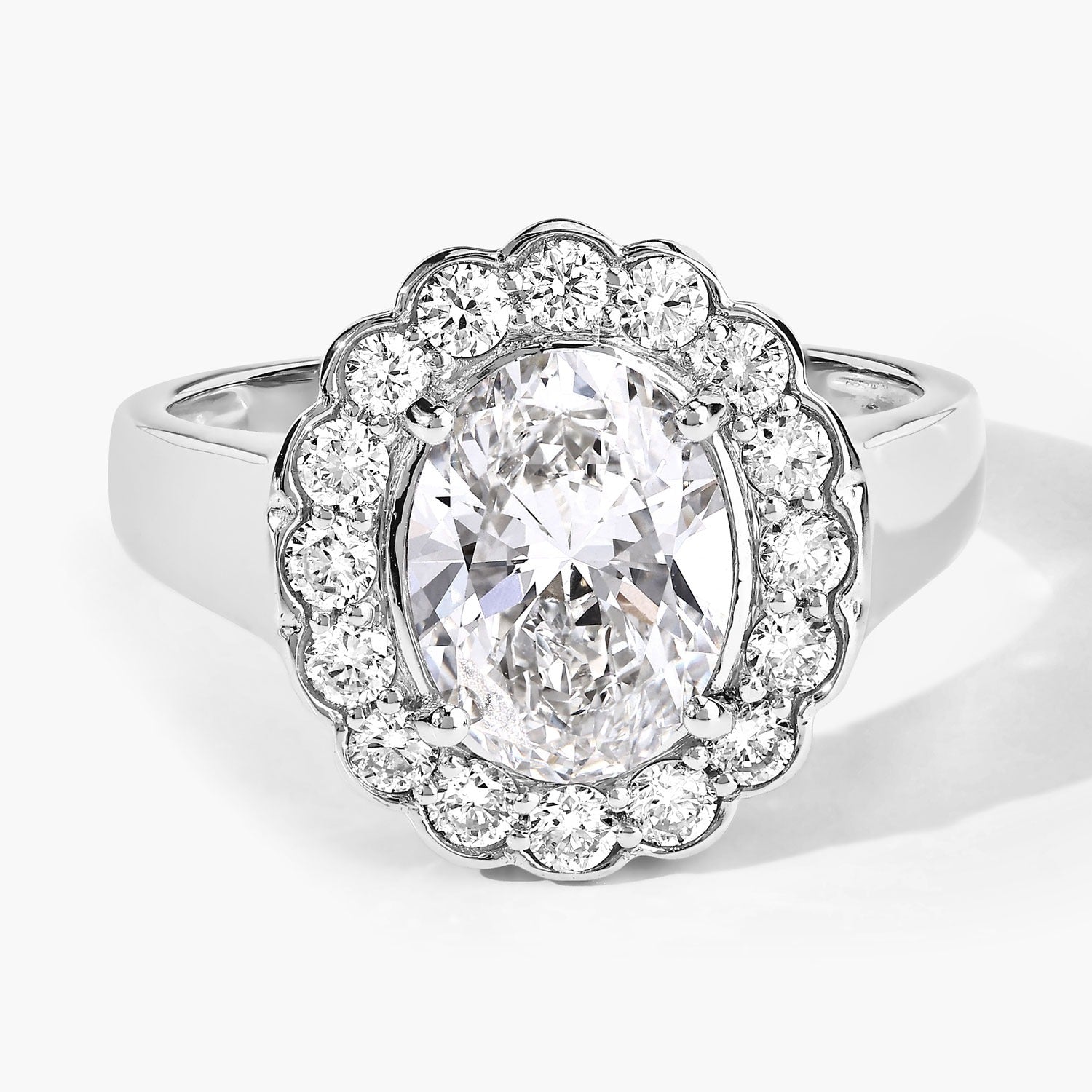 2.48 Ct Oval Lab Grown Diamond Platinum Floral Halo Bridal Ring